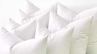 A set of 7 different decorative pillow inserts.